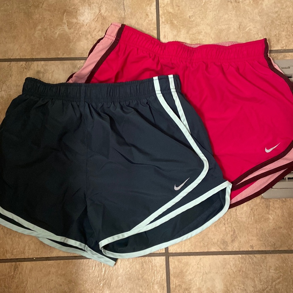 Two pairs of Nike Tempo running shorts